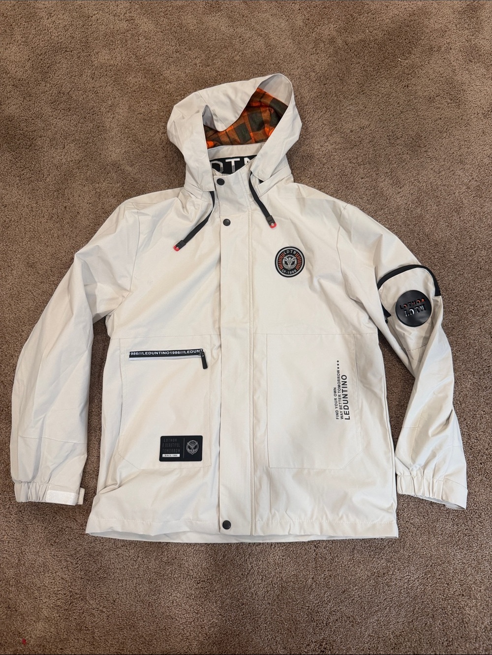 Lightweight White Hooded Windbreaker Jacket with Badge Detail
